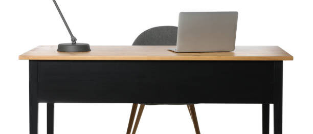 Stylish workplace with wooden desk and comfortable chair on white background