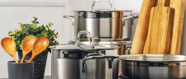 Clean saucepan on a gas stove in kitchen. Close up.